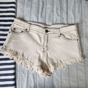 BDG Cream Colored Distressed Short Shorts